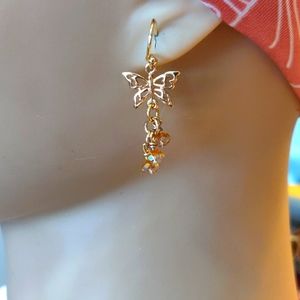 New rose gold butterfly earrings.